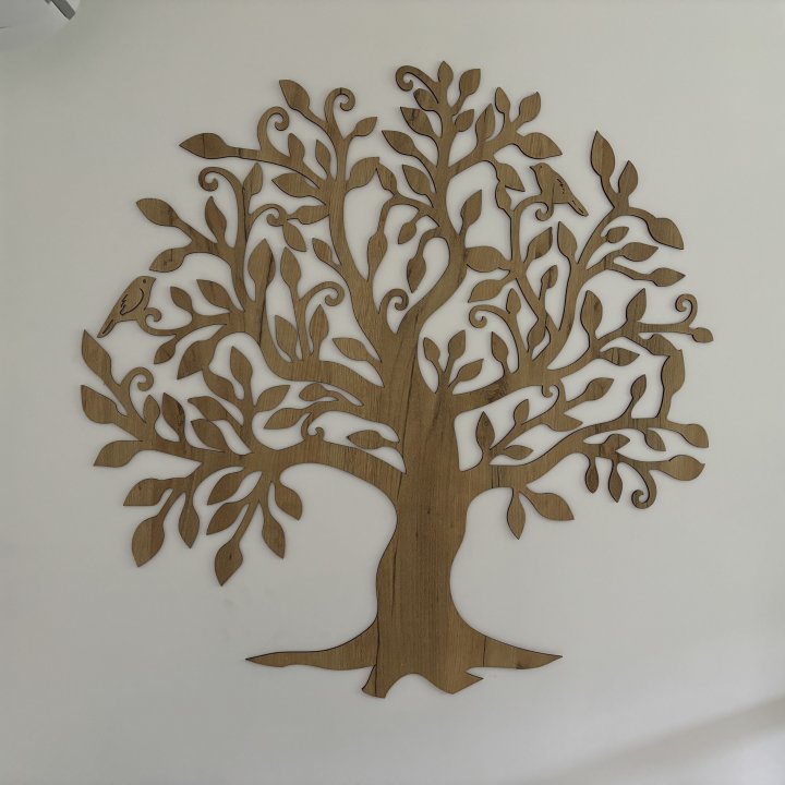 Dessein stylisé d'arbre de la Maison Gaïa